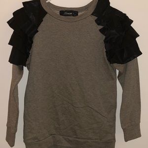 Custom sweater with leather sleeves
